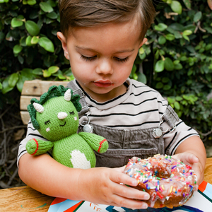 Soft Baby Triceratops plush toy, perfect comforter and lovey for little ones, shown from angle 5.