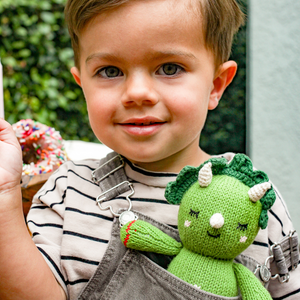 Soft Baby Triceratops plush toy, perfect comforter and lovey for infants, shown from angle 6.