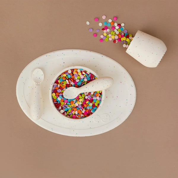 First Foods Set for babies, featuring colorful bowls and utensils, perfect for introducing solid foods at mealtime.