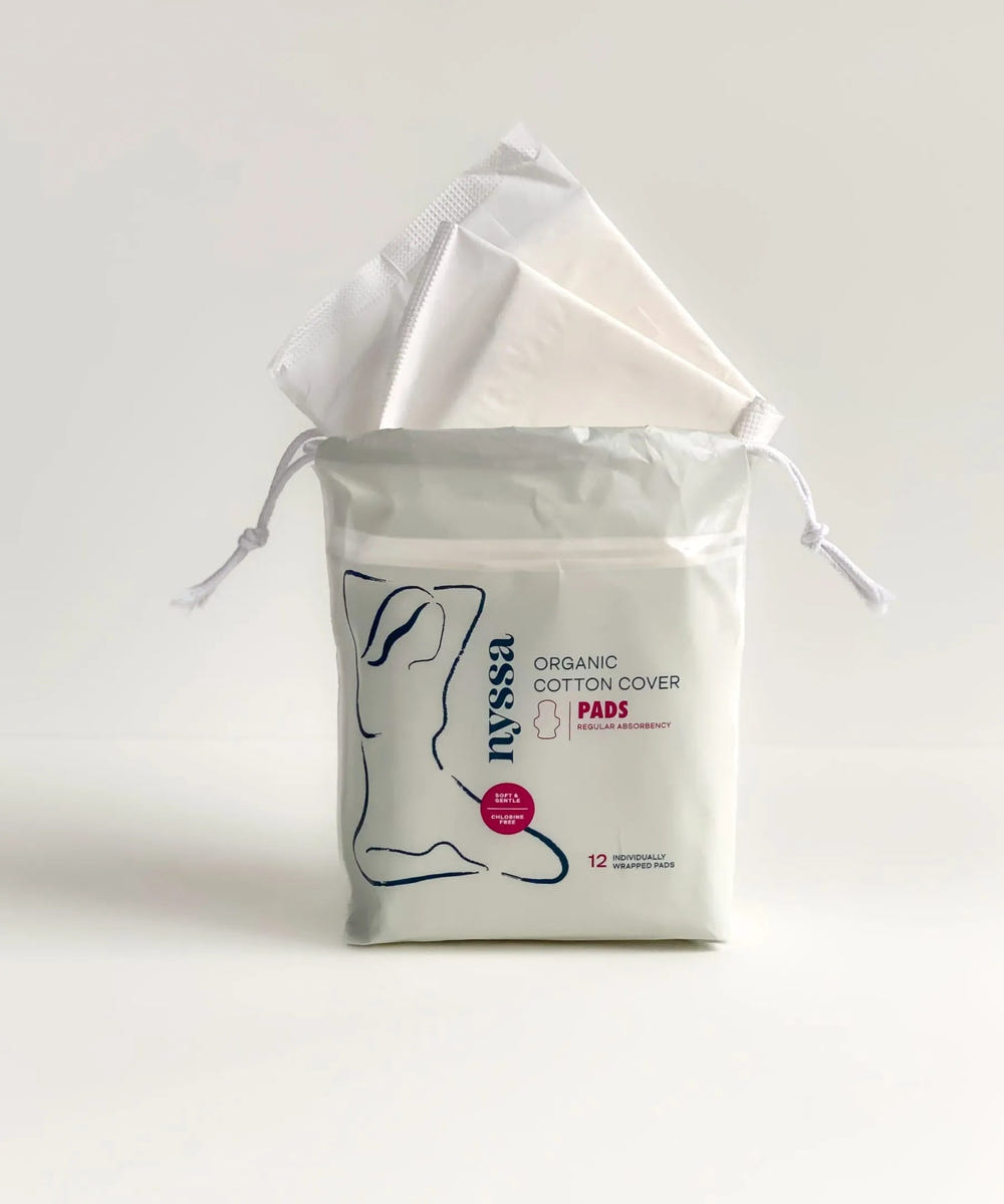 Organic cotton cover regular absorbency menstrual pads for comfortable and eco-friendly protection.