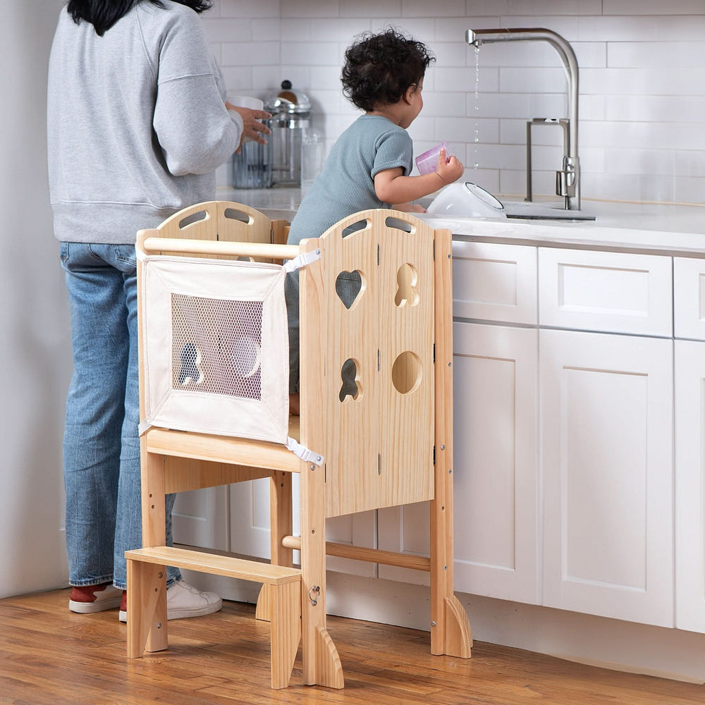 Laurel 4-in-1 Foldable Kitchen Tower for toddlers: step stool, slide, and chalkboard in one versatile design.