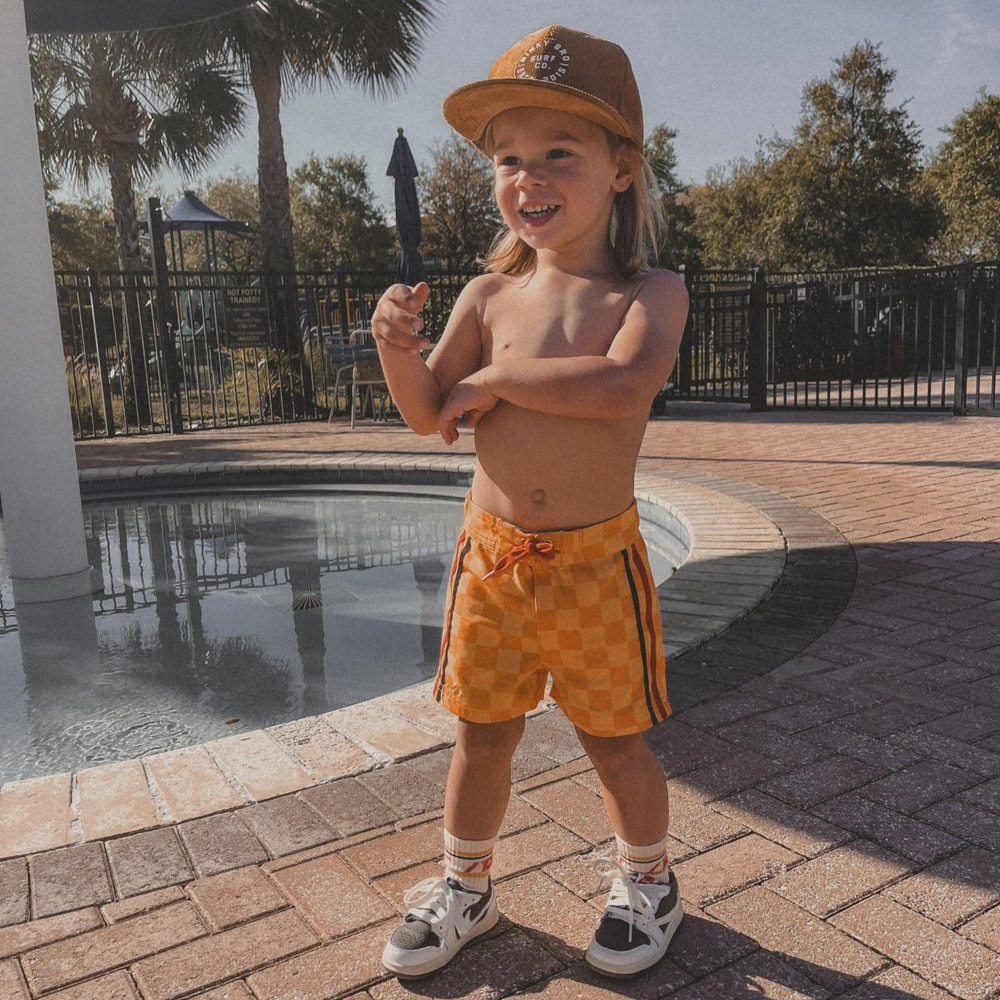 Retro-wave hybrid board shorts in yellow for babies and toddlers, perfect for summer fun and beach days.
