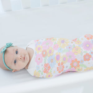 Retro floral baby swaddle blanket, perfect for cozying up your little one in style.