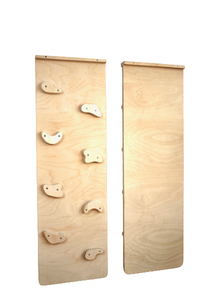 Reversible rockwall climbing and sliding ramp for babies, promoting active play and motor skills development.
