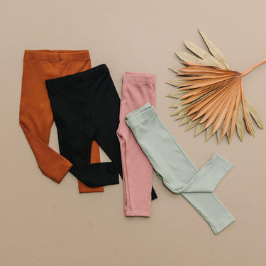 Ribbed bamboo leggings for kids in various colors, soft and comfortable for everyday wear.