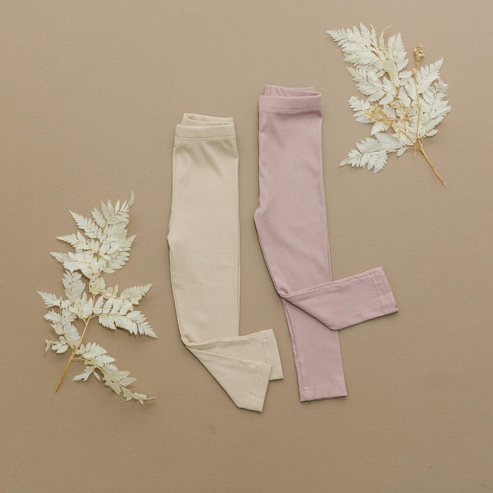 Ribbed bamboo leggings for kids in various colors, soft and comfortable for everyday wear.