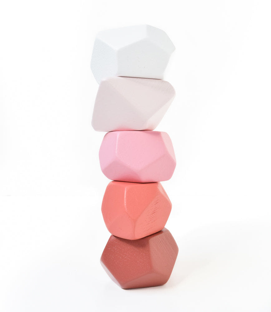 Blush set of 5 early learning and sensory play toys for babies, promoting exploration and development.