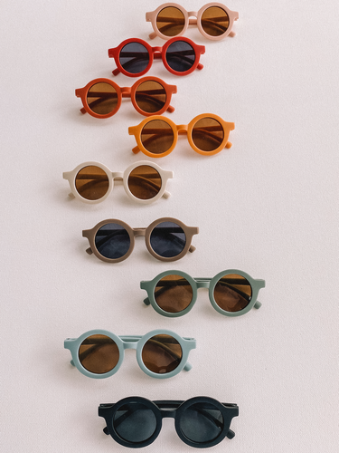 Round baby sunglasses for stylish sun protection in vibrant colors. Perfect for toddlers and infants.
