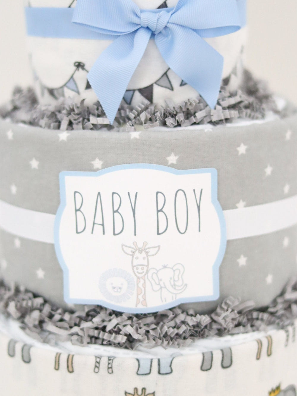 Royal Safari Diaper Cake featuring adorable animal designs, perfect for baby showers and newborn gifts.