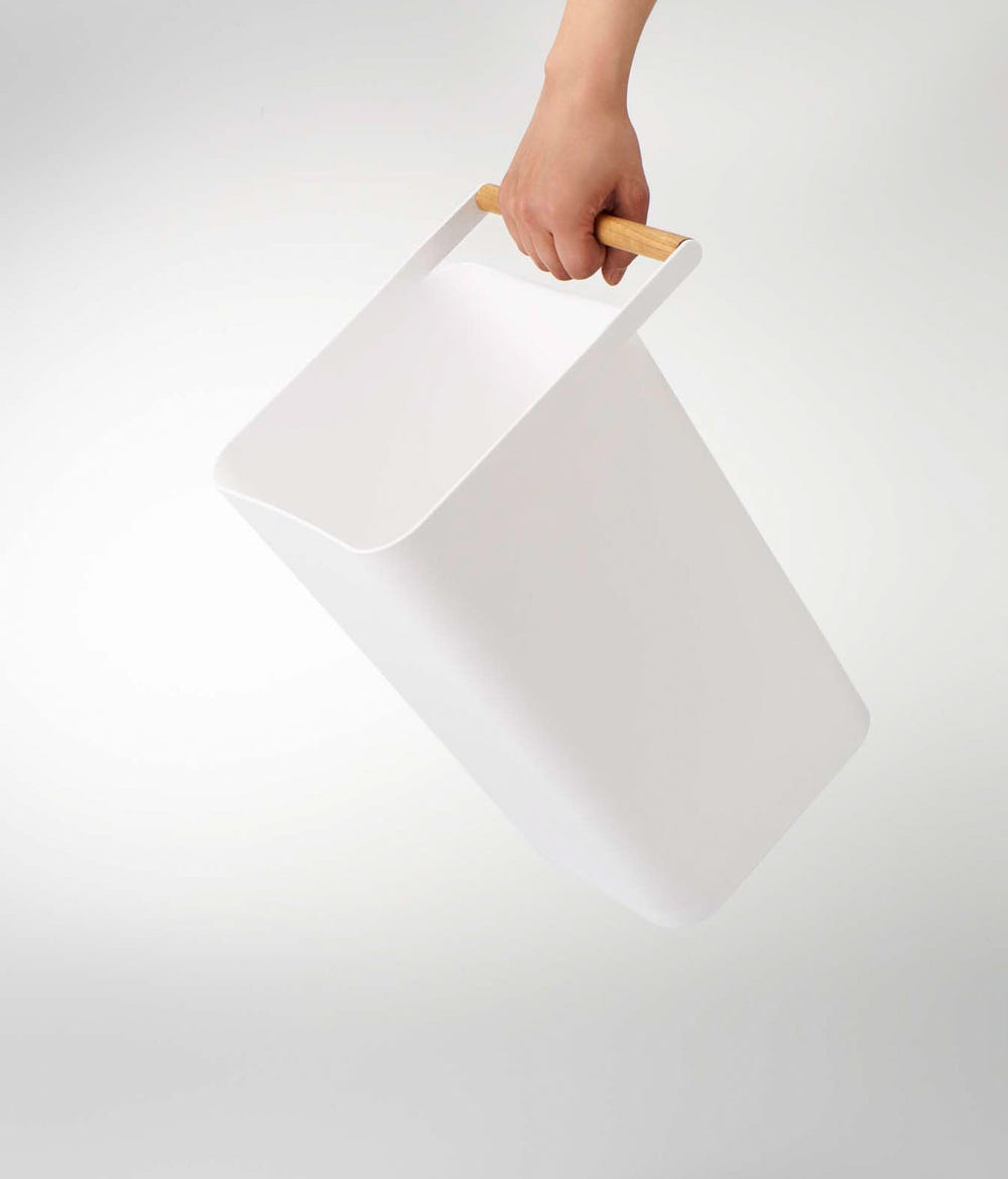 Stylish baby trash can for nursery, perfect for discreetly disposing of diapers and waste.
