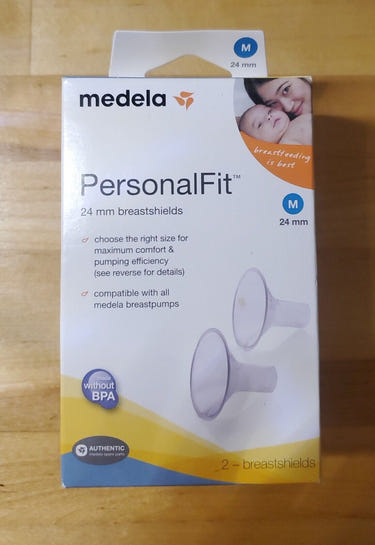 Medela PersonalFit Flange 24mm - Spare part for breast pumps, old style, essential for comfortable pumping.
