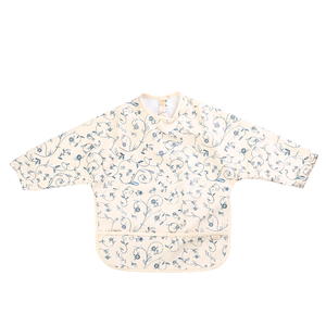 Scandi Floral Smock Bib for babies, featuring a vibrant design and easy-clean material. Perfect for mealtime messes.