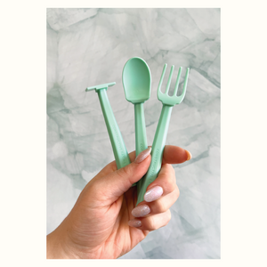 Colorful baby training utensils set for easy feeding and self-feeding practice.