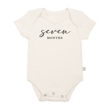 Charcoal graphic bodysuit for seven months milestone, short sleeve design for babies.