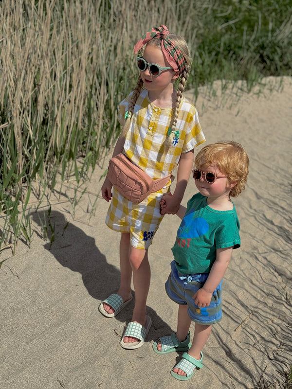 Fern plaid slide sandal for babies, showcasing a stylish design from angle 3. Perfect summer footwear for little ones.