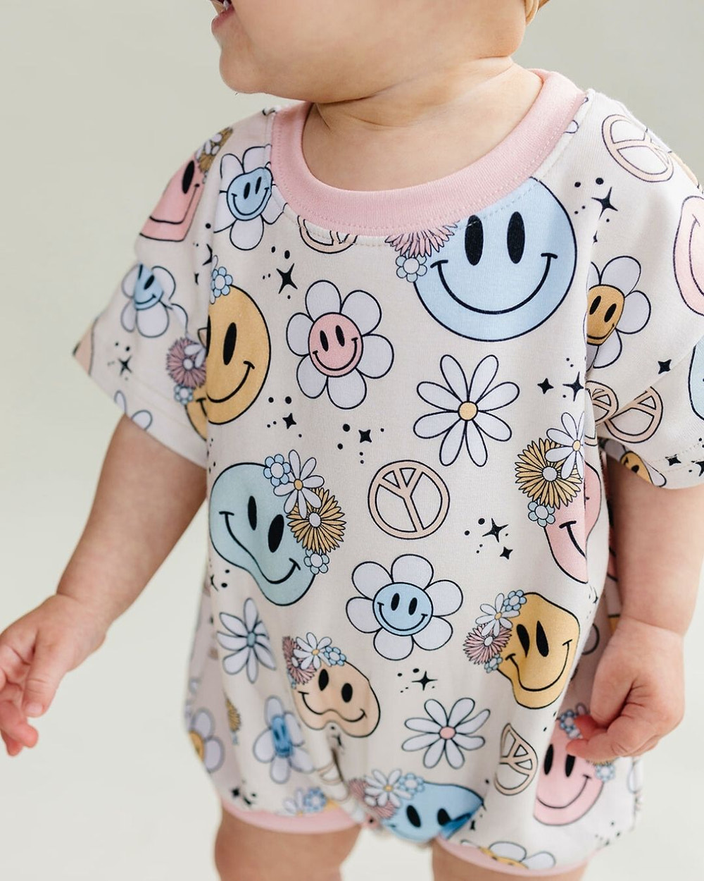 Short Sleeve Bubble Romper for babies by Groovy Girl - stylish and comfortable romper for playful moments.
