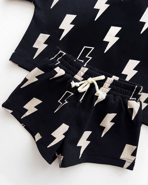 Black bolts shorts set for babies, stylish and comfortable, showcased from angle 3. Perfect for playful outfits.