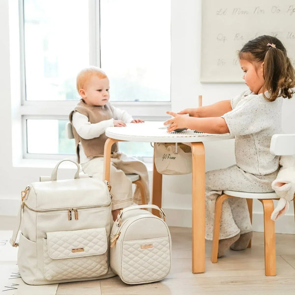 Signature Pearl White Diaper Bag at angle 11, stylish and functional for modern parents.