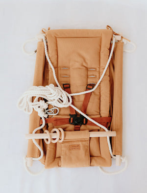"Grow With Me Nutmeg Swing - versatile baby swing for comfort and fun, perfect for growing infants."