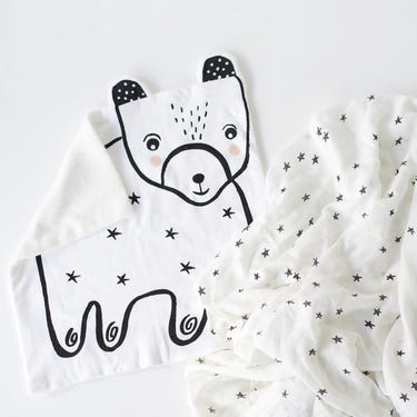 "Stars Snuggle Bundle gift set for babies featuring soft blankets and plush toys in a charming design."