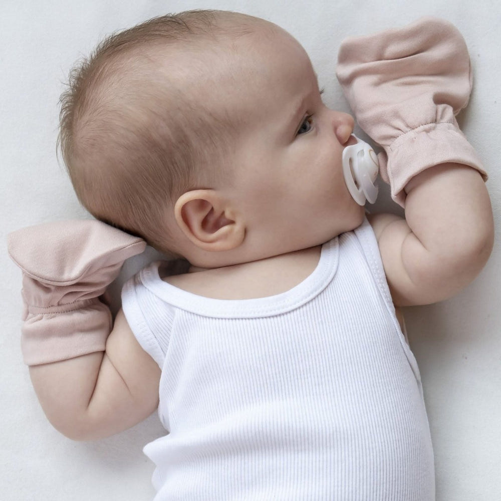 Stay On Mitts in Rose for babies - soft, stylish, and perfect for keeping little hands warm and cozy.