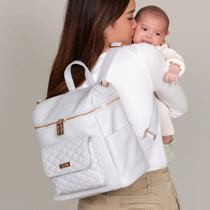 Pastel pink Petit Diaper Bag at angle 12, stylish and functional for modern parents.