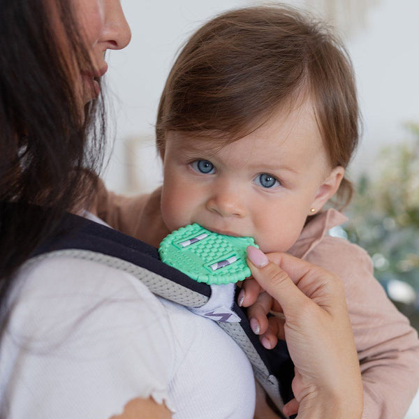 The Strappie Teether for Baby Carriers and Backpacks