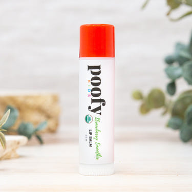 Organic Strawberry Smoothie Lip Balm for babies - gentle, nourishing oral care in a cute, colorful packaging.