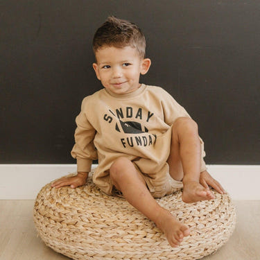 "Sunday Funday Football Sweatshirt Romper in various colors for babies - cozy and stylish clothing."