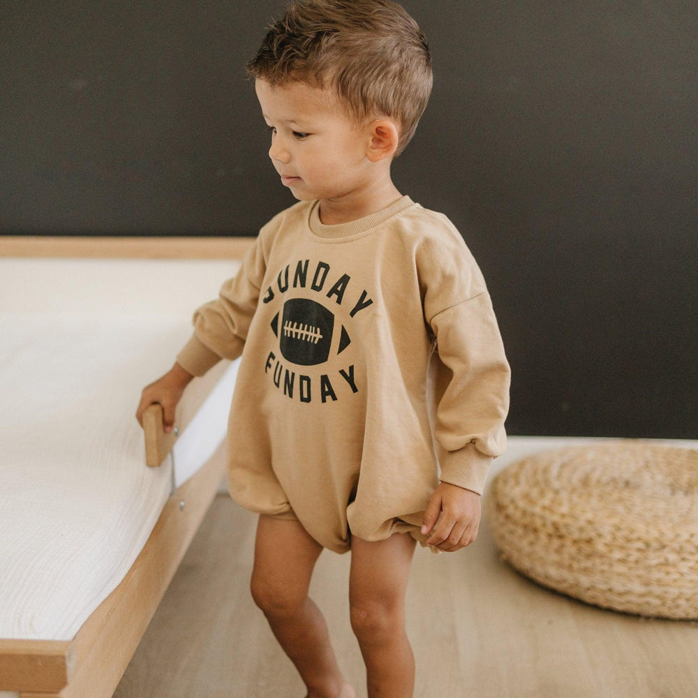 "Sunday Funday Football Sweatshirt Romper in various colors for babies - cozy and stylish clothing."