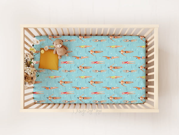 Baby Dogs crib sheet in minky and jersey fabric, angled view showcasing soft, playful design for nursery decor.