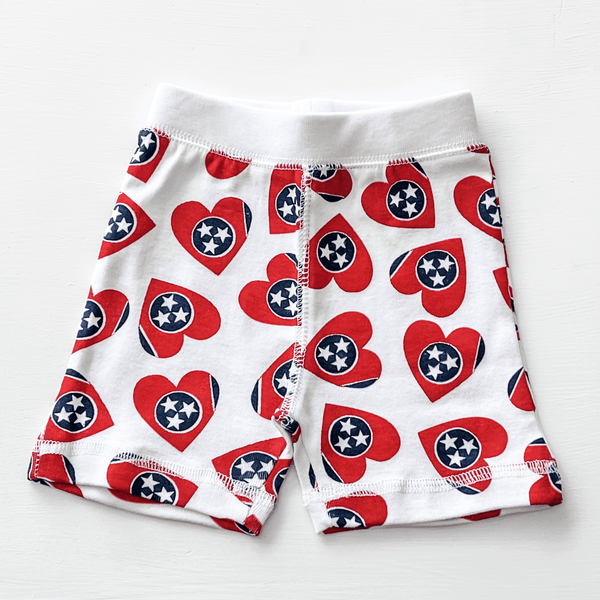 Tennessee Pajamas for babies, cozy and stylish, shown from angle 4, perfect for comfort and sleep.