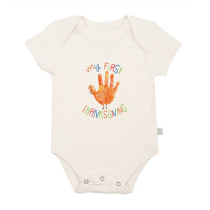 Thanksgiving-themed graphic bodysuit for babies with hand design, perfect for festive celebrations.