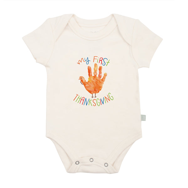 Thanksgiving-themed graphic bodysuit for babies with hand design, perfect for festive celebrations.
