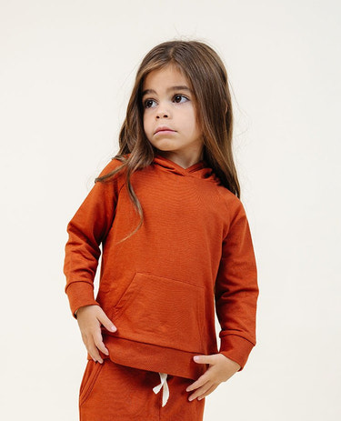 Cozy baby hoodie in chili red, perfect for warmth and style in any season.