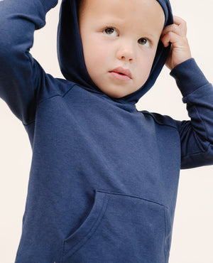 Coziest Hoodie in Midnight for babies, featuring soft fabric and a stylish design, perfect for comfort and warmth.
