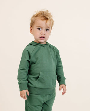 Cozy moss green hoodie for babies, perfect for warmth and style. Angle 3 view showcasing soft fabric and design.