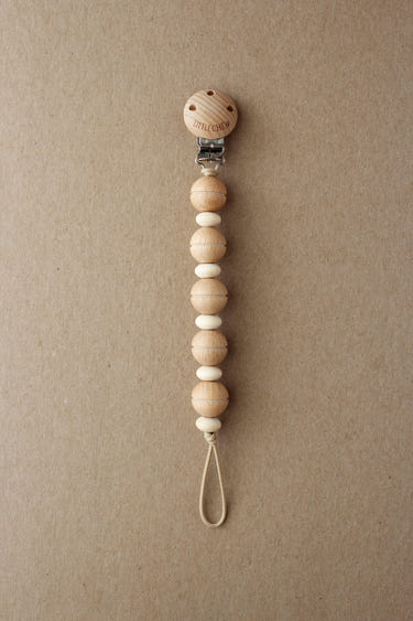 Theo Pacifier Clip - Stylish and secure pacifier holder for babies, perfect for keeping pacifiers within reach.