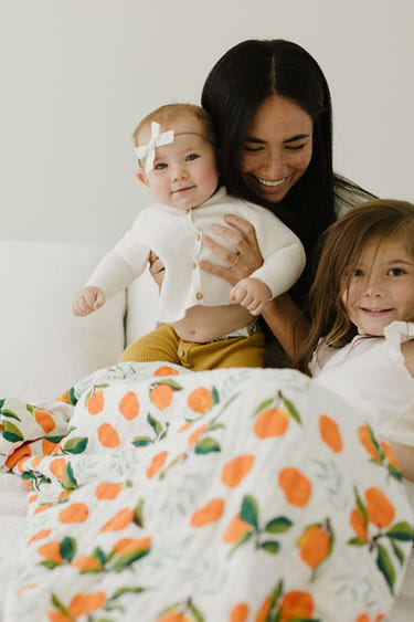 Clementine Throw Blanket - Cozy quilt for babies, perfect for warmth and comfort in nursery or playtime.