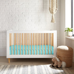Cooling bamboo crib fitted sheet at a 27-degree angle, perfect for a comfortable baby's sleep.