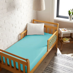 Cooling bamboo crib fitted sheet at a 25-degree angle, perfect for a comfortable baby's sleep.