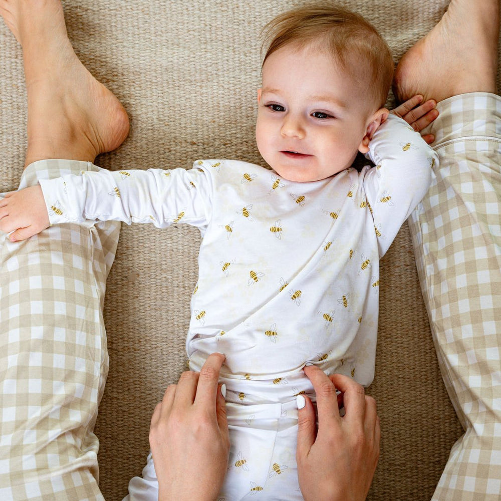 Toddler pajama set featuring a fun busy bees print, perfect for comfortable sleepwear.