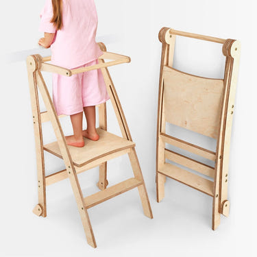 Foldable beige toddler tower step stool for safe and easy access to counters and tables. Ideal furniture for toddlers.
