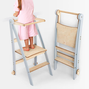 Foldable gray toddler tower step stool for safe and easy access to counters and tables. Ideal for toddlers.