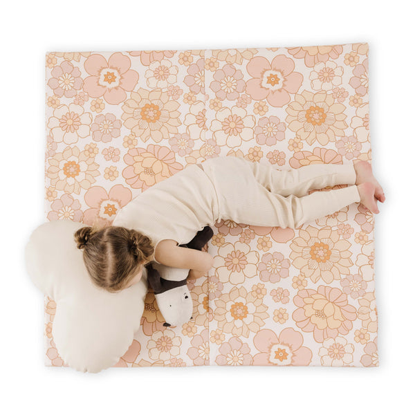 Blooms Vegan Leather Mat in angle view, perfect for stylish and safe baby playtime.