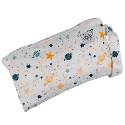 Travel changing pad for babies, angled view showcasing its compact design and soft fabric, perfect for on-the-go parents.