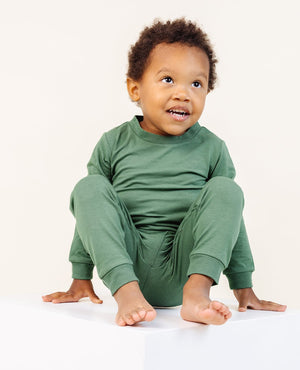 Ultimate Pajama Set in Moss for babies, showcasing soft fabric and cozy design from angle 2.