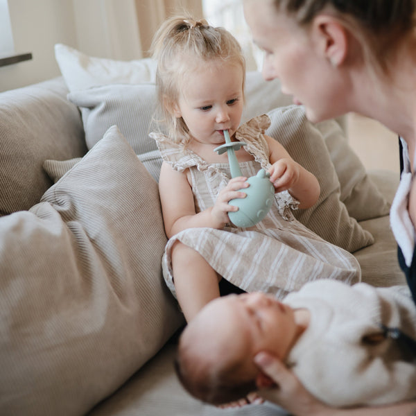 "Star Training Toothbrush for babies, angled view showcasing its soft bristles and ergonomic design for easy grip."