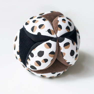 Colorful Clutch Ball - Acorn for babies, promoting sensory play and motor skills development.