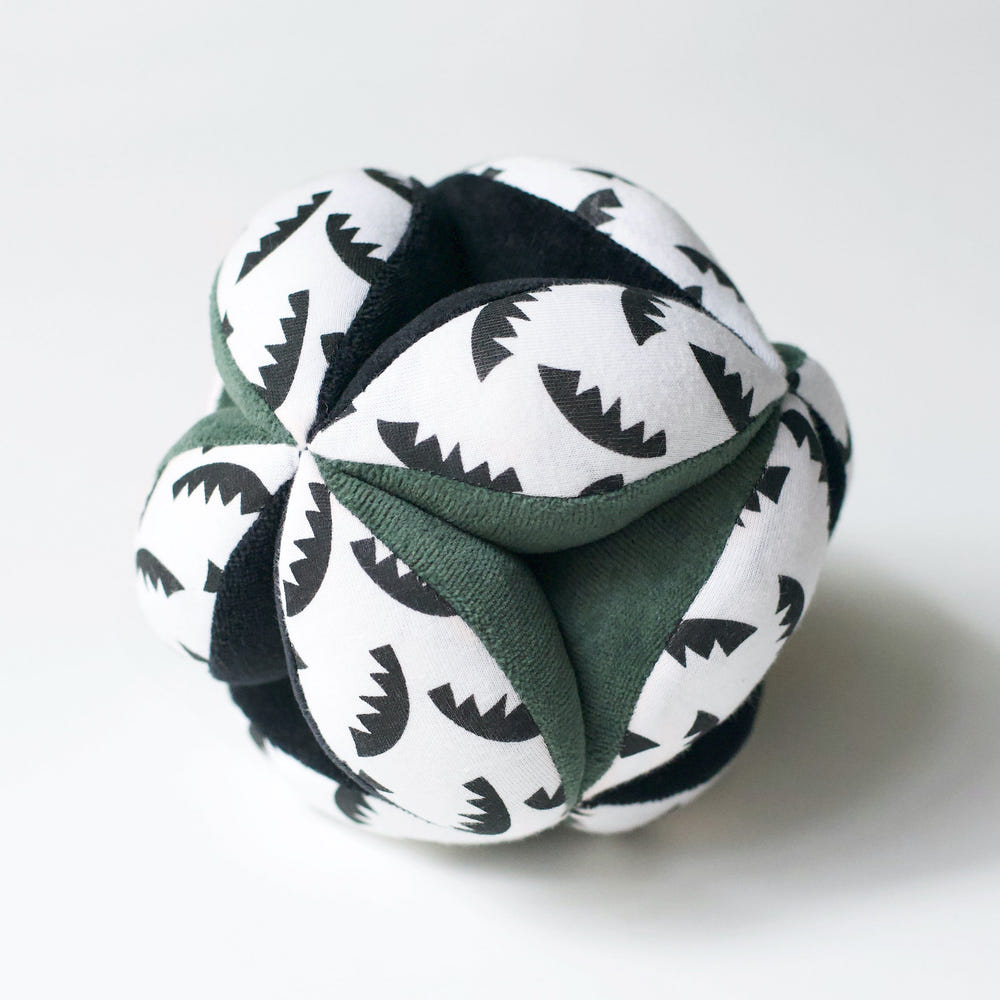 Jungle Leaves Clutch and Taggy Ball Bundle for babies, featuring vibrant colors and soft textures for sensory play.